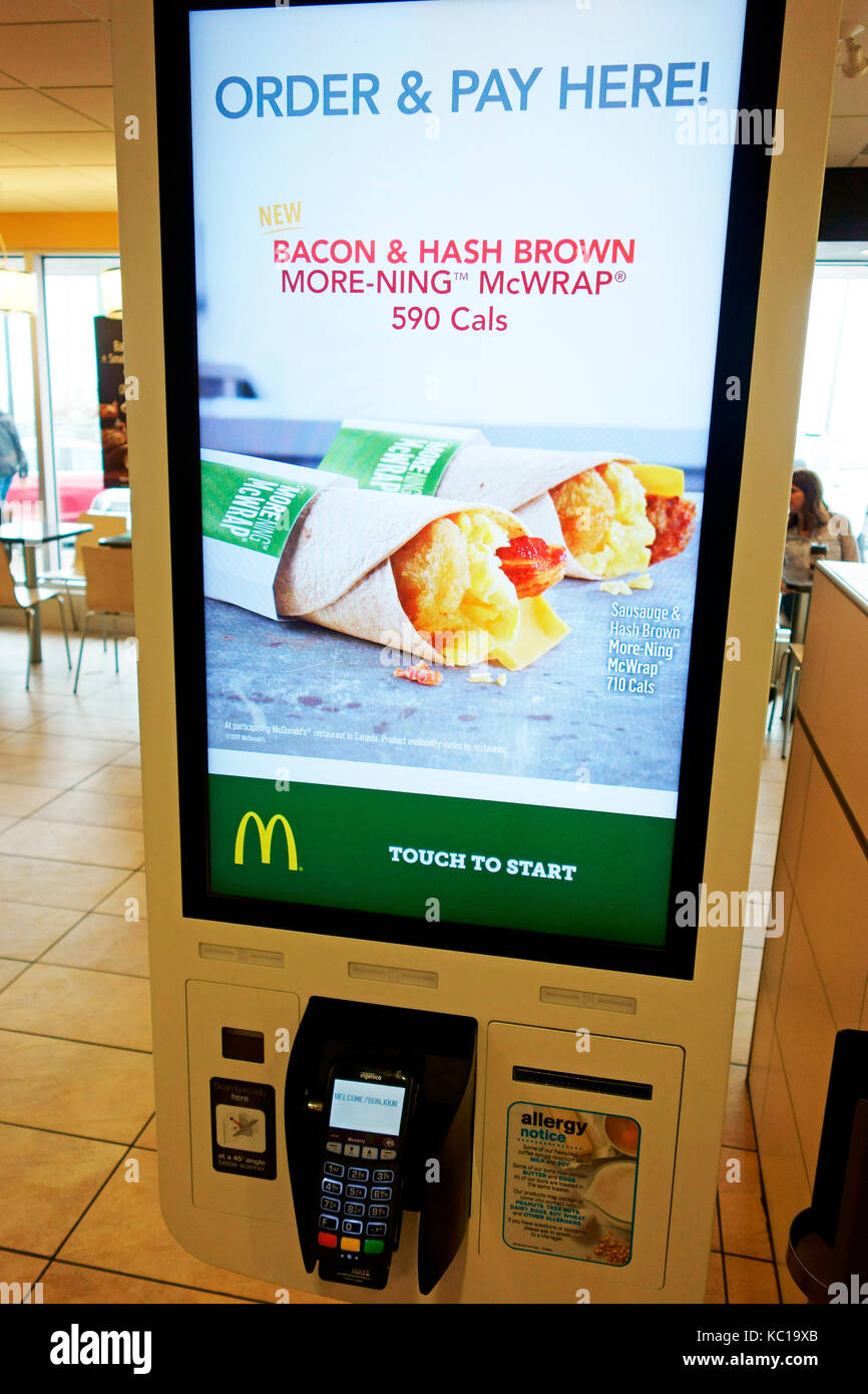 An order keyosk kiosk at a McDonalds restaurant Stock Photo
