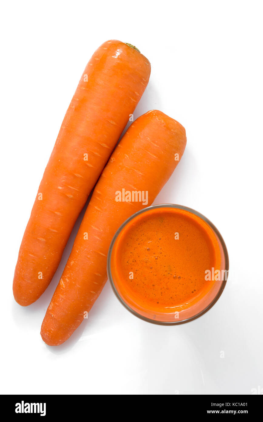 grass of carrot juice isolated on white background Stock Photo Alamy