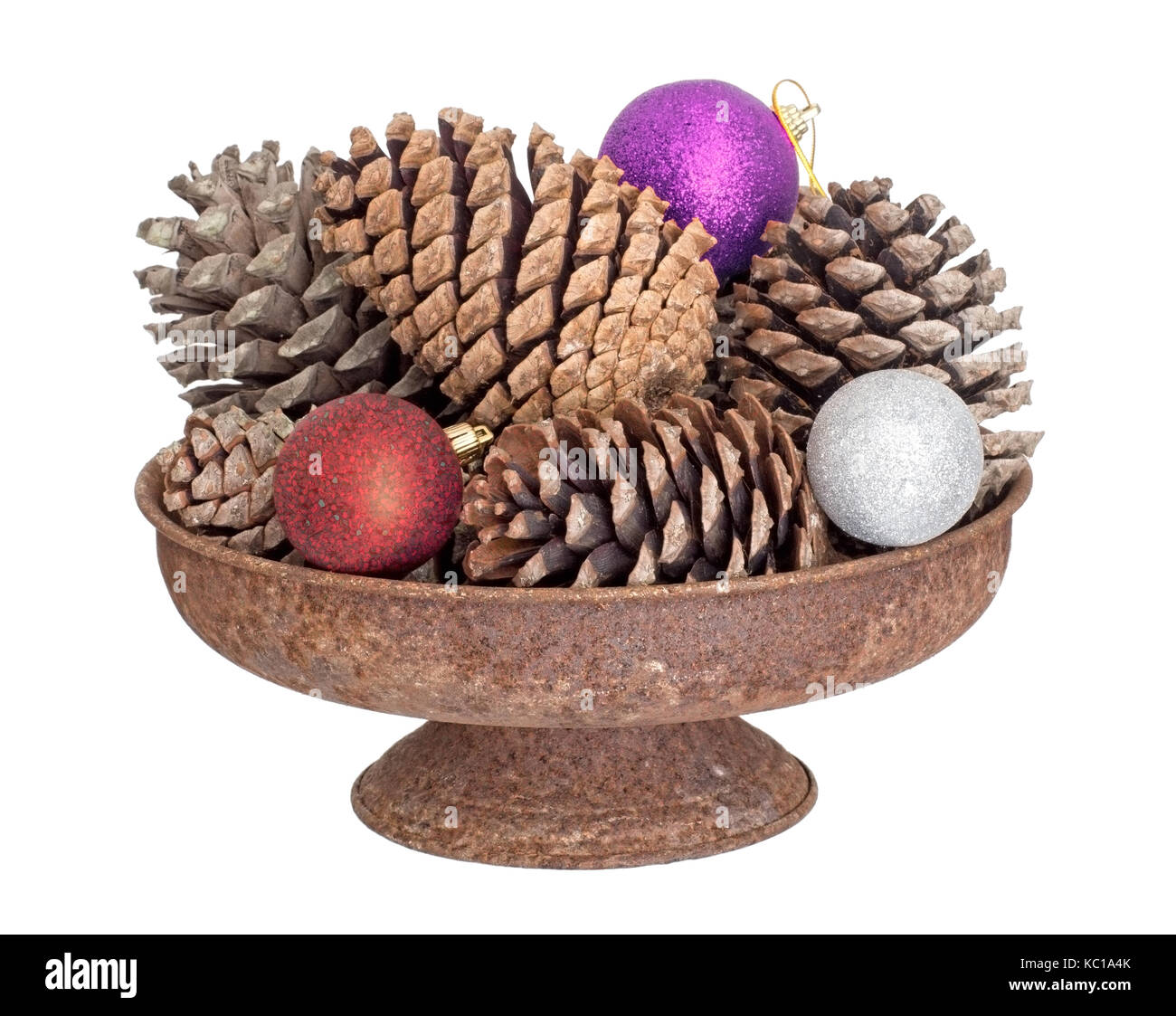 Pine cones, winter festive or seasonal decoration. With baubles. Stock Photo