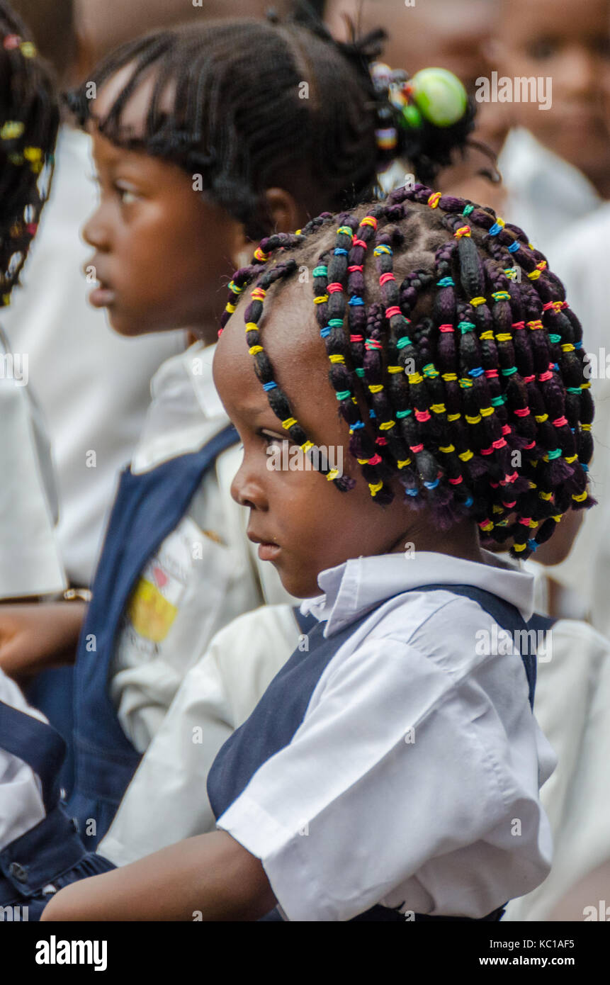 Young African school girl with beautifully decorated hair at pre-school in Matadi, Congo, Central Africa Stock Photo
