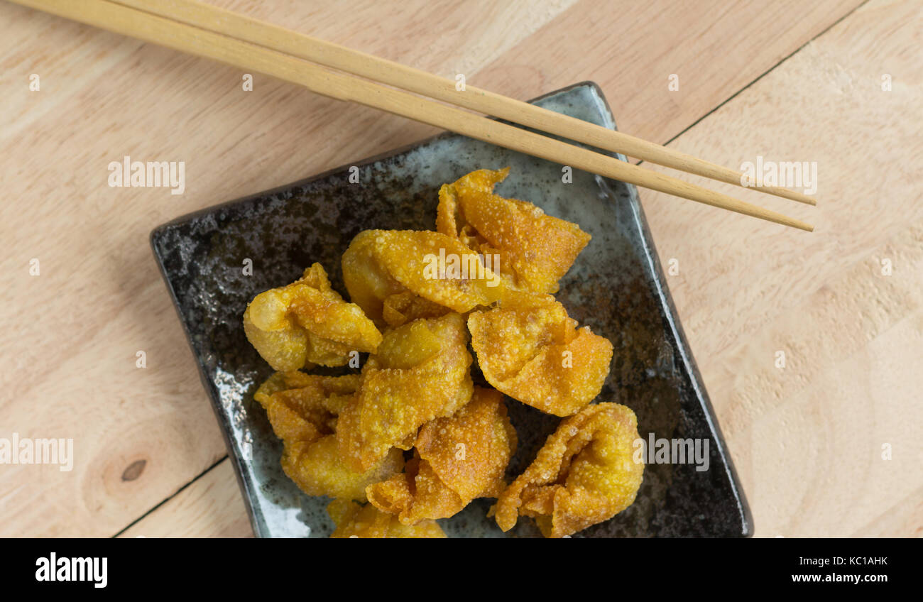 Deep fried dumpling or wonton with pork stuffed. This is popular food
