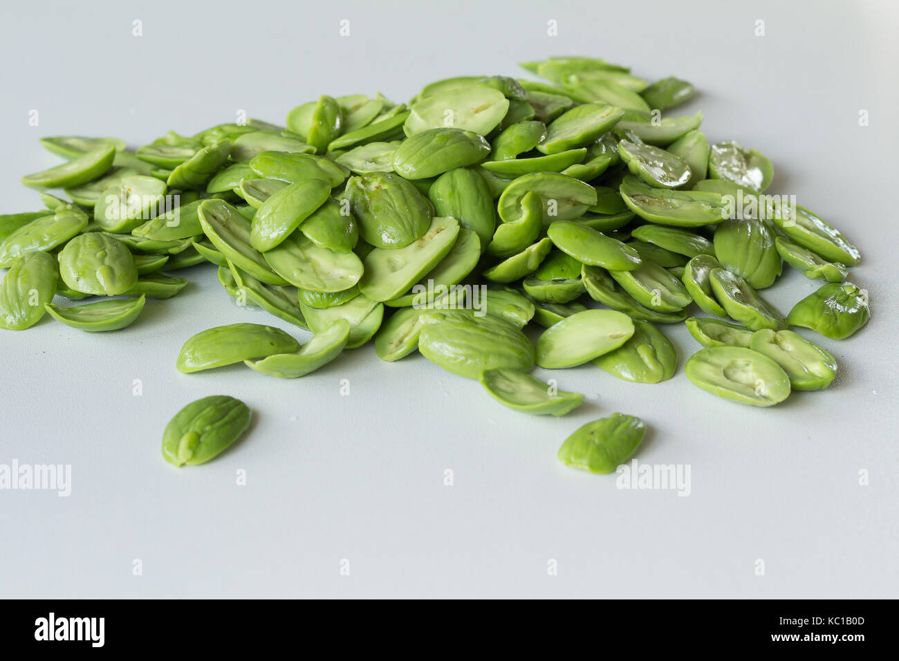 The fresh Parkia on white background  which is tropical stinking edible beans, Thailand Stock Photo