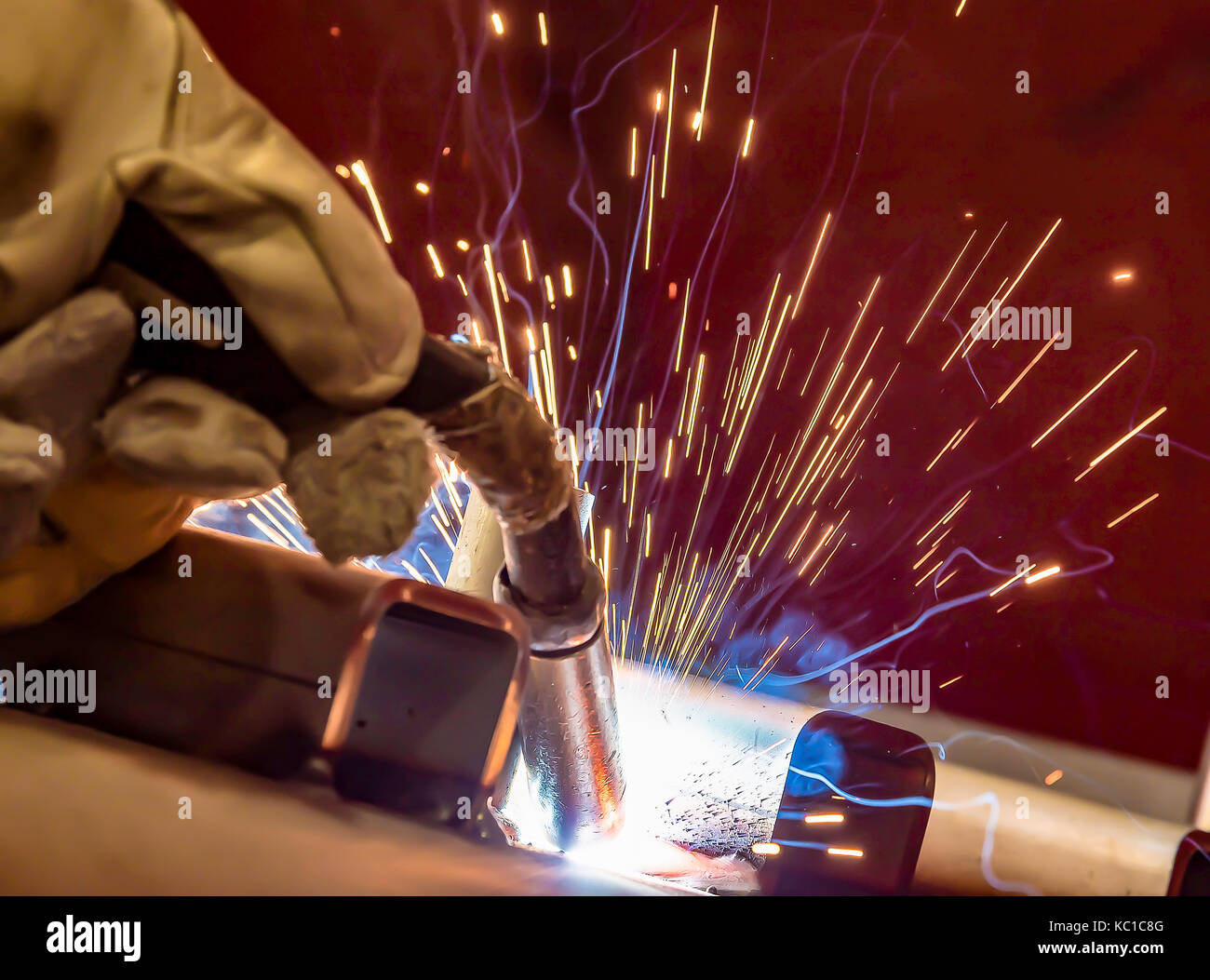 welder, craftsman, erecting technical steel Industrial steel welder in ...