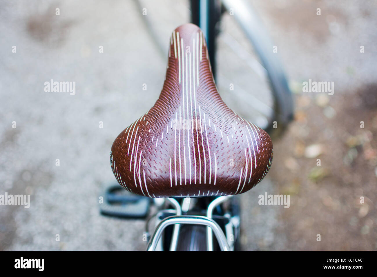 Vintage bicycle with leather seat close up Stock Photo Alamy