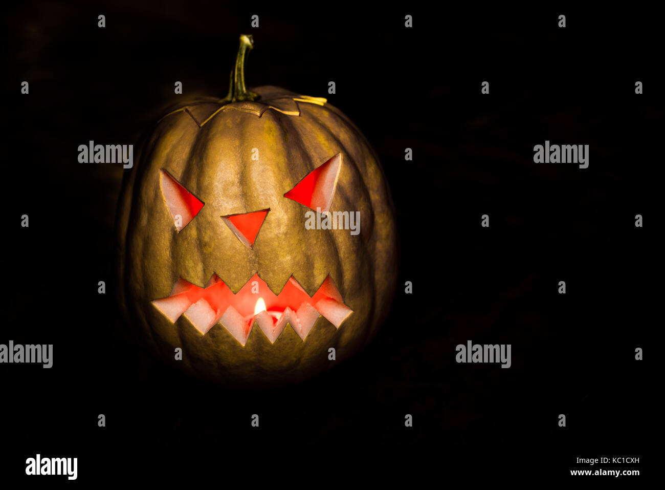 Scary Halloween pumpkins isolated on a black background Stock Photo - Alamy