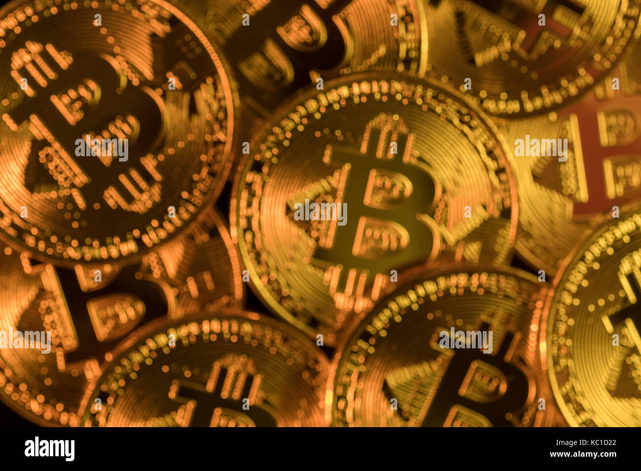 Gold Bitcoins as metaphor for concept of virtual currency, peer to peer digital payment, darkweb cybercrime, general cryptocurrencies, & exchange rate Stock Photo
