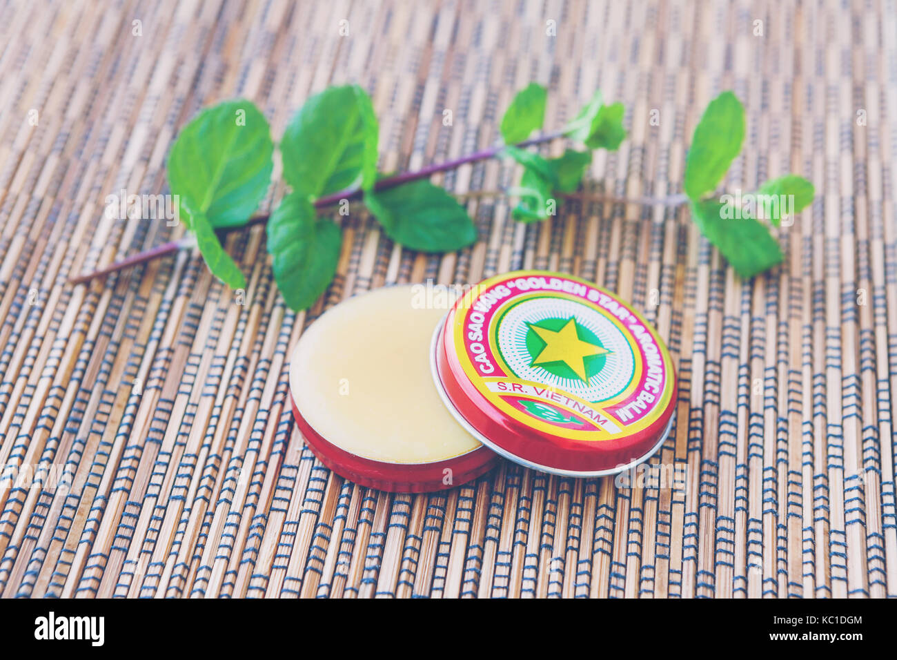 Vietnamese traditional golden star balm 'Cao Sao Vang' Stock Photo