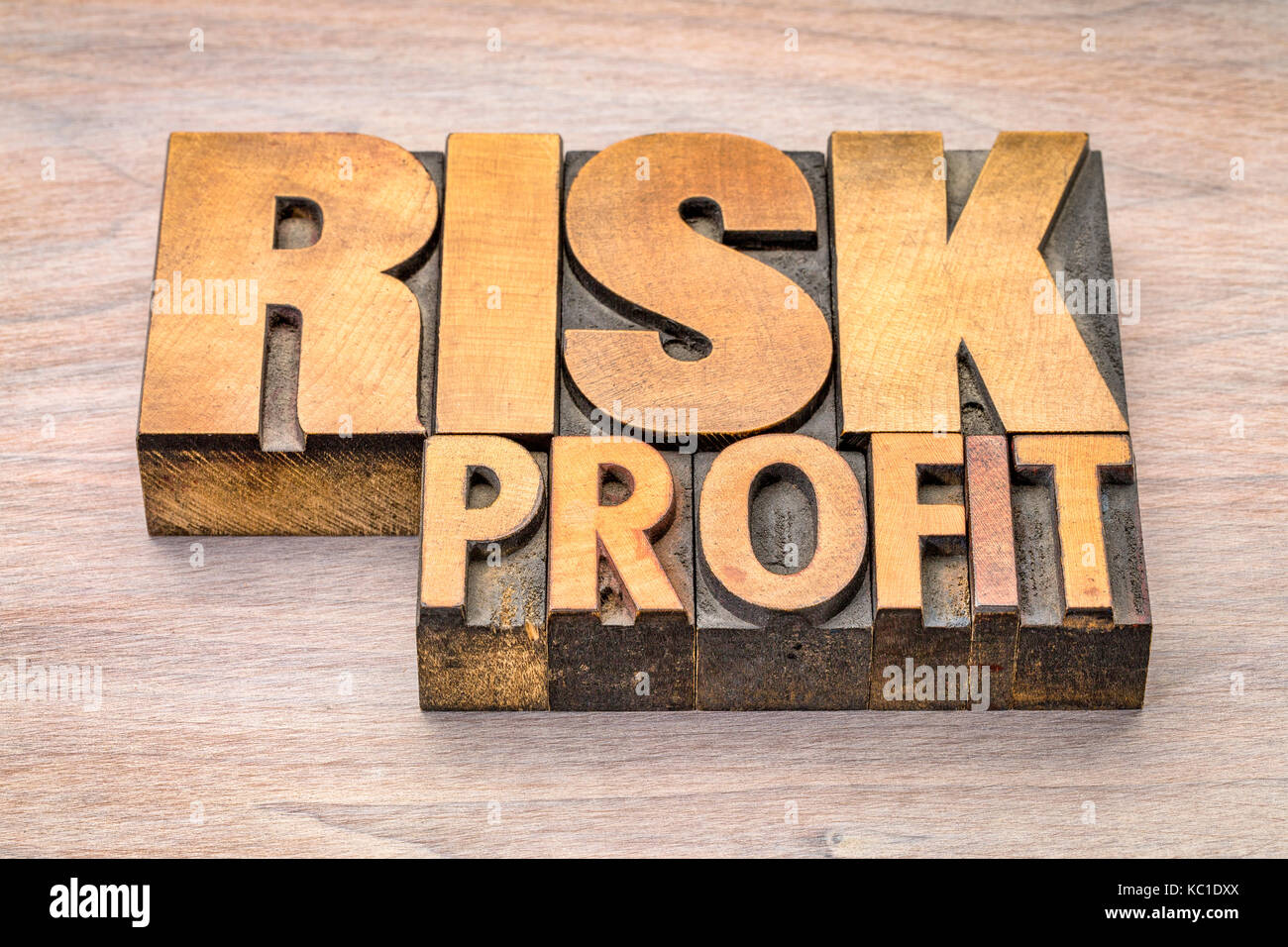 risk and profit word abstract in vintage letterpress wood type Stock Photo