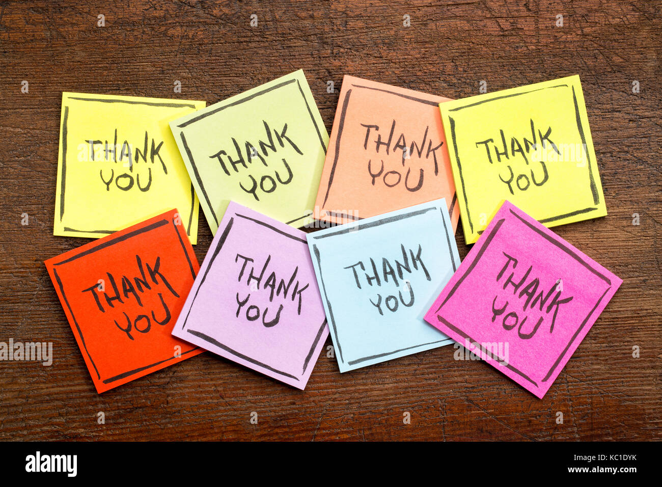 Rustic Sticky Note thank you abstract - handwriting on a set of colorful sticky notes ...