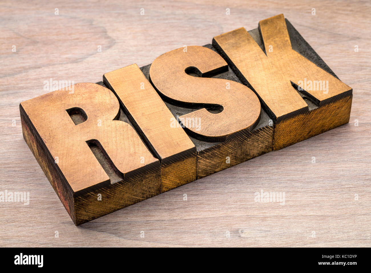 risk word abstract in vintage letterpress wood type Stock Photo