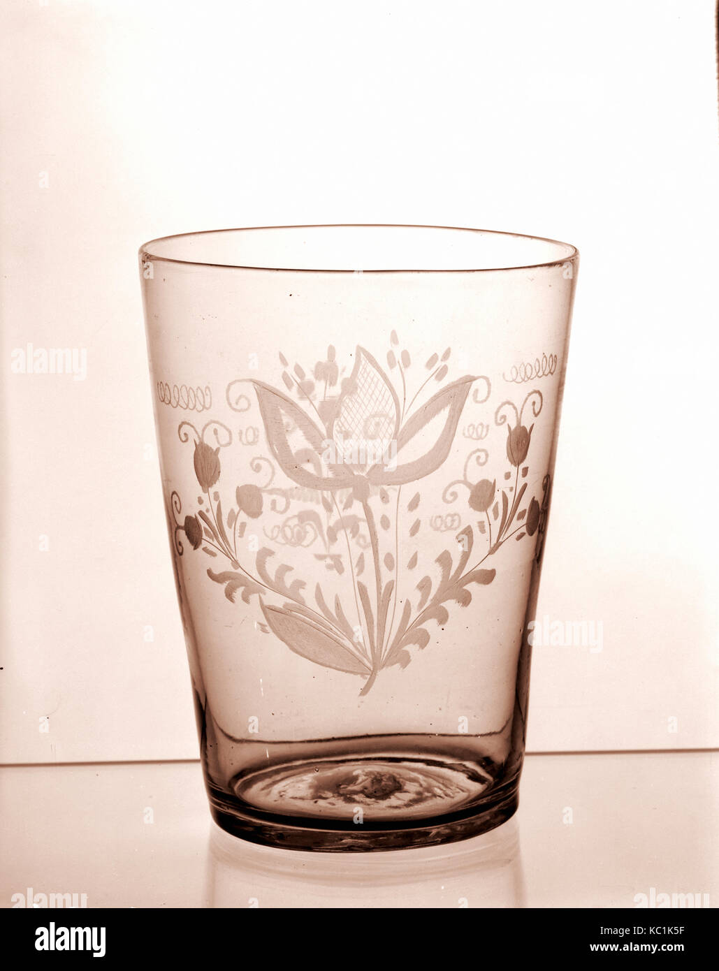 Tumbler, 1700–1800, Made in Bohemia, Czech Republic, Glass with engraved decoration, 7 1/8 x 5 3/8 in. (18.1 x 13.7 cm), Glass Stock Photo