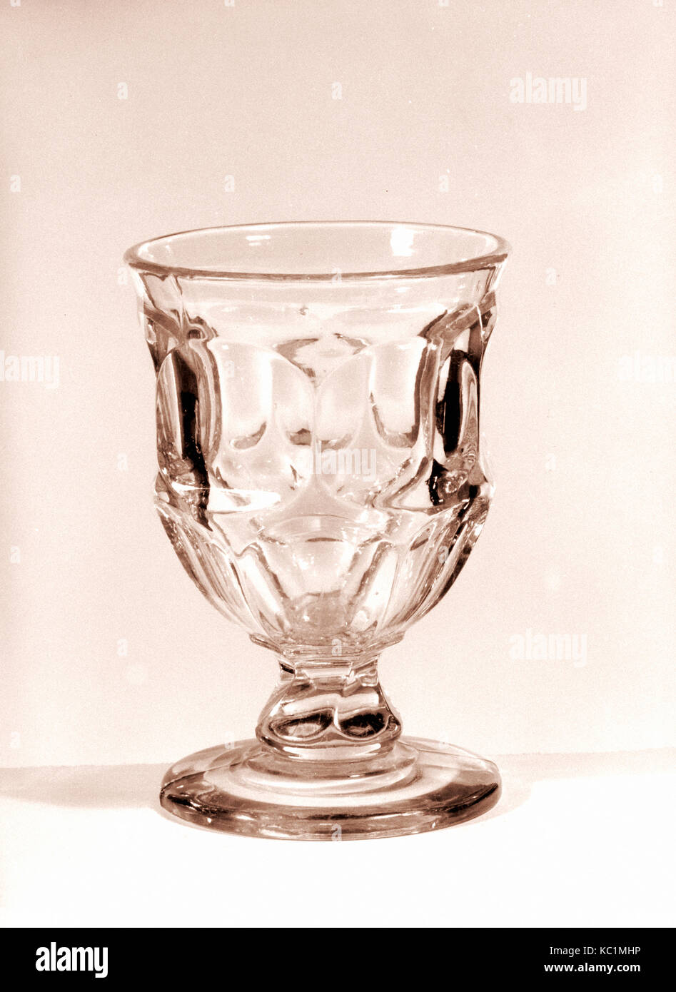Cordial, 1830–70, Made in United States, American, Pressed glass, H. 3 1/2 in. (8.9 cm), Glass, With the development of new form Stock Photo