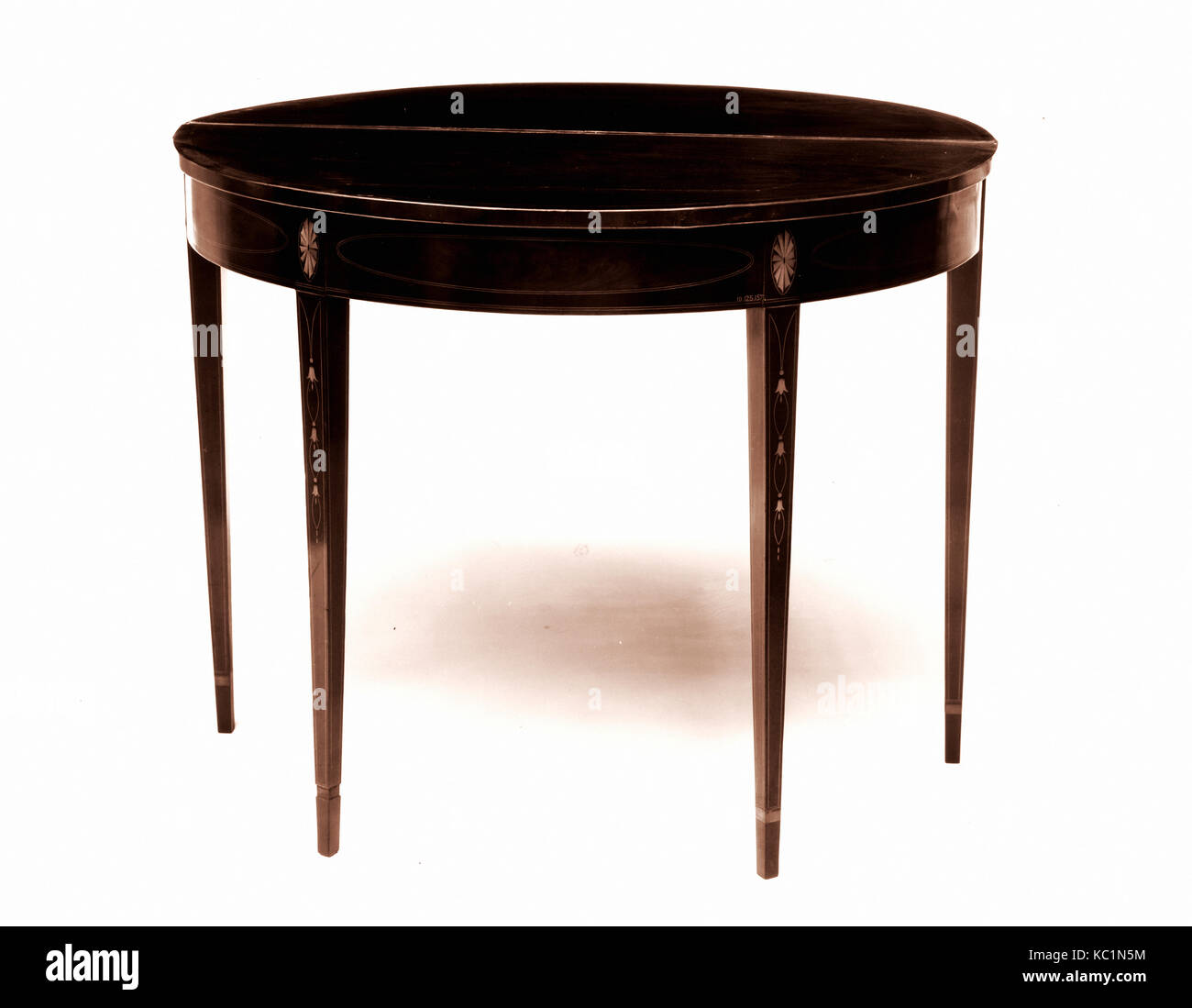 Card Table, 1790–1805, Made in New York, New York, United States, American, Mahogany, maple, satinwood, white pine, 36 x 57 in Stock Photo