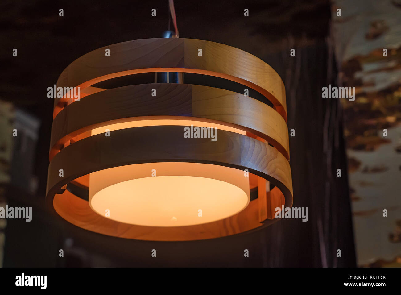 Modern wooden chandelier on the ceiling Stock Photo Alamy