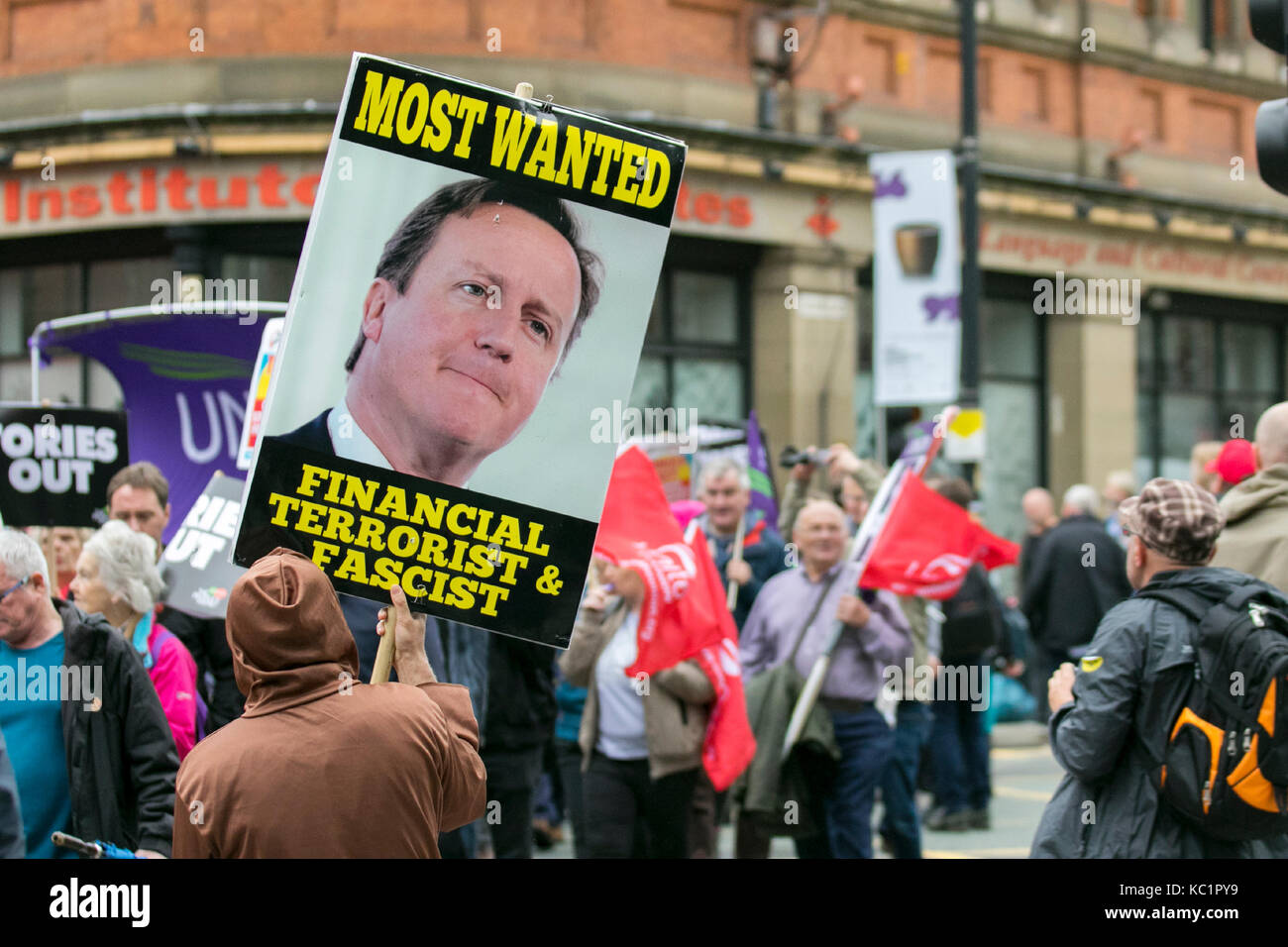 Manchester, UK. 1st October, 2017. Thousands of demonstrators bring the streets of Manchester to a standstill as protestors take part in a massive 'Tories Out' protest to end Austerity measures.  Anti-Brexit campaigners and activists protesting the government’s austerity policies are holding rallies to coincide with the start of the Conservative Party conference being held in the city centre. 100's of Police from outlying areas have been drafted in to the monitor the event with large areas of the city being subject to a cordon with many roads closed. Credit. MediaWorldImages/AlamyLiveNews Stock Photo