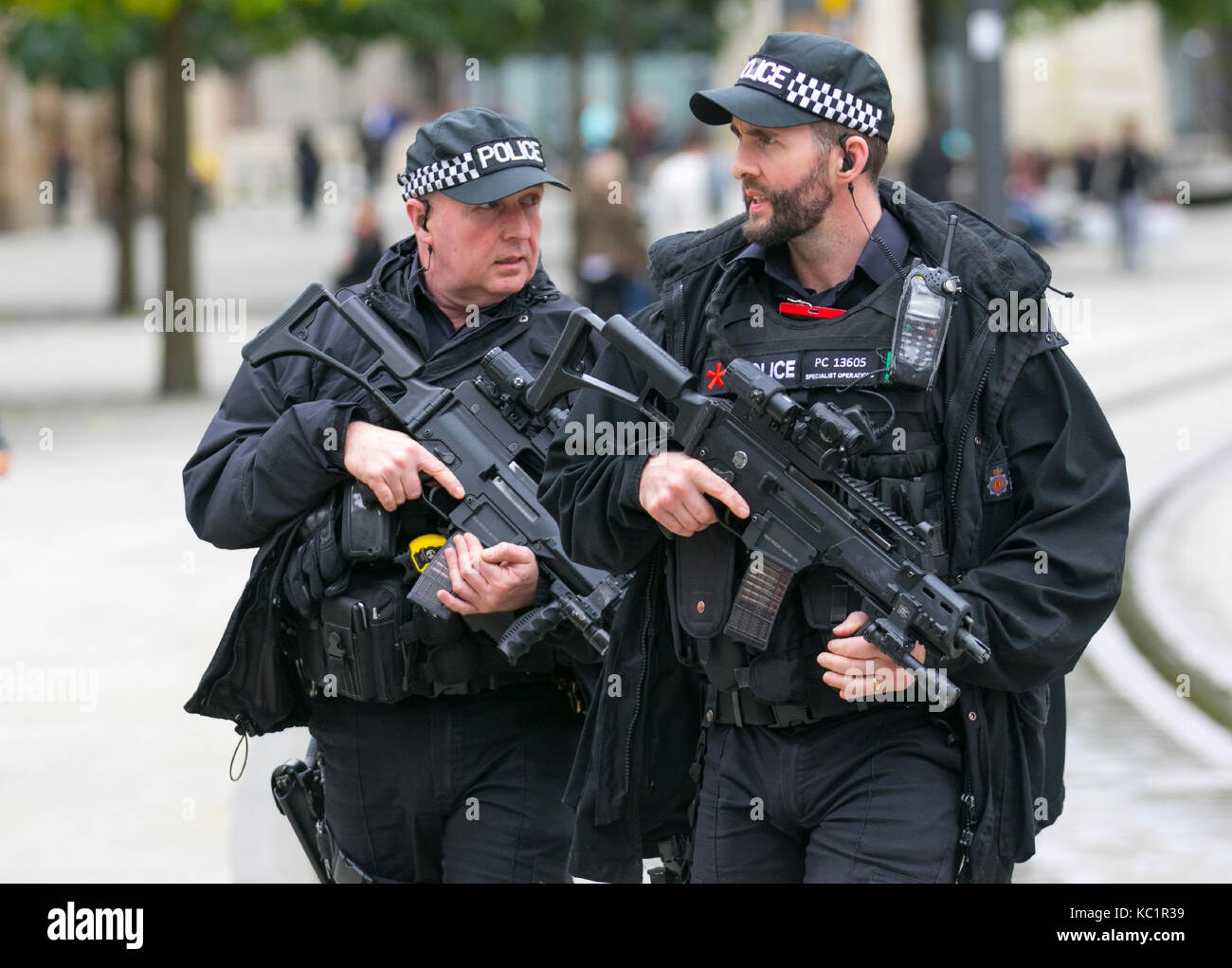 Manchester, UK.  Weapons, policing, police, uniform, british, force, officer, law, armed, security, control, england, patrol, gun, weapon, firearm, military, handgun, pistol, security, crime, protection, patrol, enforcement, cop, crime, shot, danger, black uniforms, firearms and equipment of British Armed Police on duty at the at the Conservative Annual Conference, 2018. Stock Photo