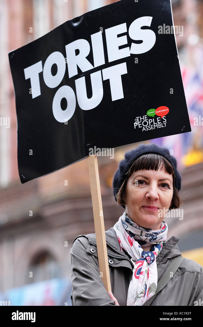 Manchester, UK. 1st October, 2017. Conservative Party Conference, An anti Tory protester outside the Midland Hotel in the city centre on the opening day of the Conservative Party Conference. Credit: Steven May/Alamy Live News Stock Photo