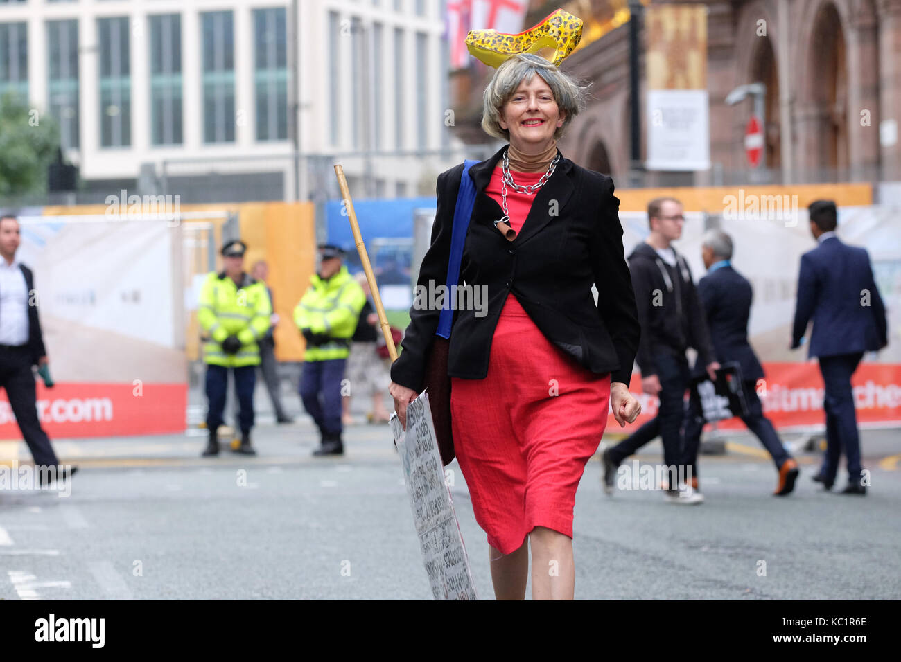 Manchester, UK. 1st October, 2017. Conservative Party Conference, Manchester UK, Sunday 1st October 2017 - A protester dressed to look like Theresa May walks past the Midland Hotel in the city centre on the opening day of the Conservative Party Conference. Credit: Steven May/Alamy Live News Stock Photo