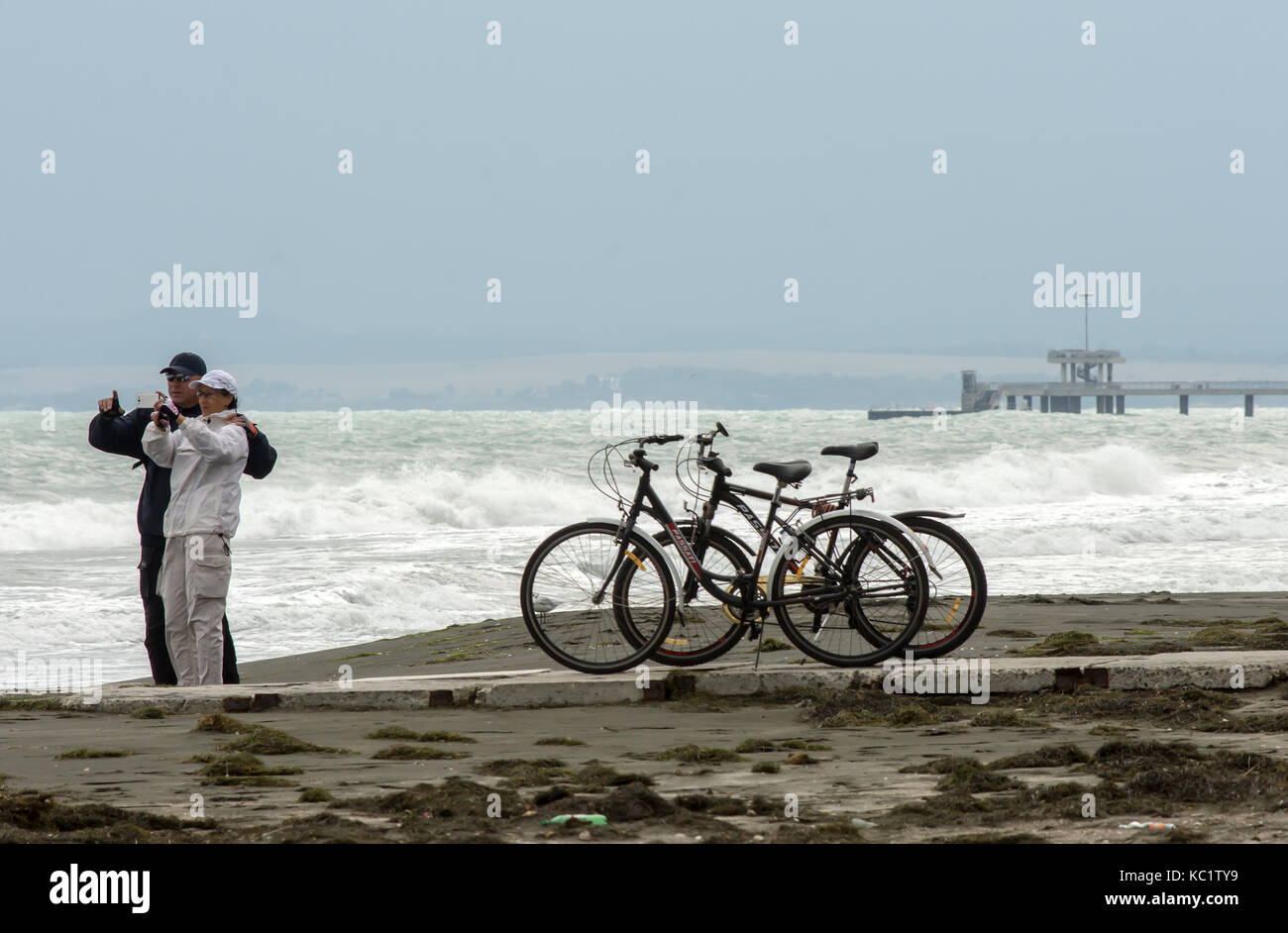 Burgas, Bulgaria. 1st October, 2017.Windy day ruff sea along the Black sea, Swans surf, Female Common Redstart poses for tourist, Bulgarians watch the waves Norton/Alamy Live News Stock Photo