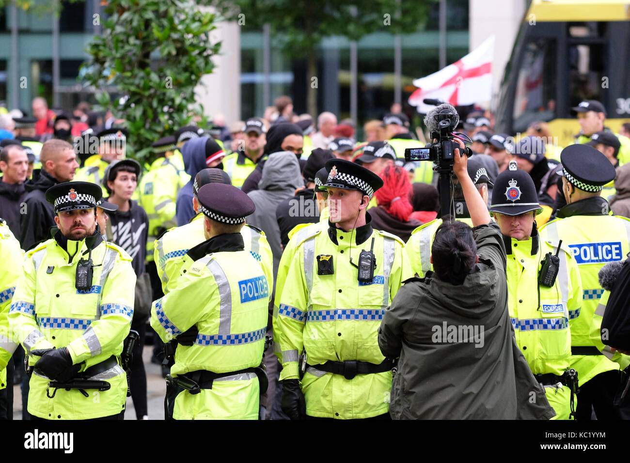 St Peters Square, Manchester, UK - Sunday 1st October 2017 - Police officers surround and kettle a small group of protesters outside the Conservative Party Conference. Photo Steven May / Alamy Live News Stock Photo