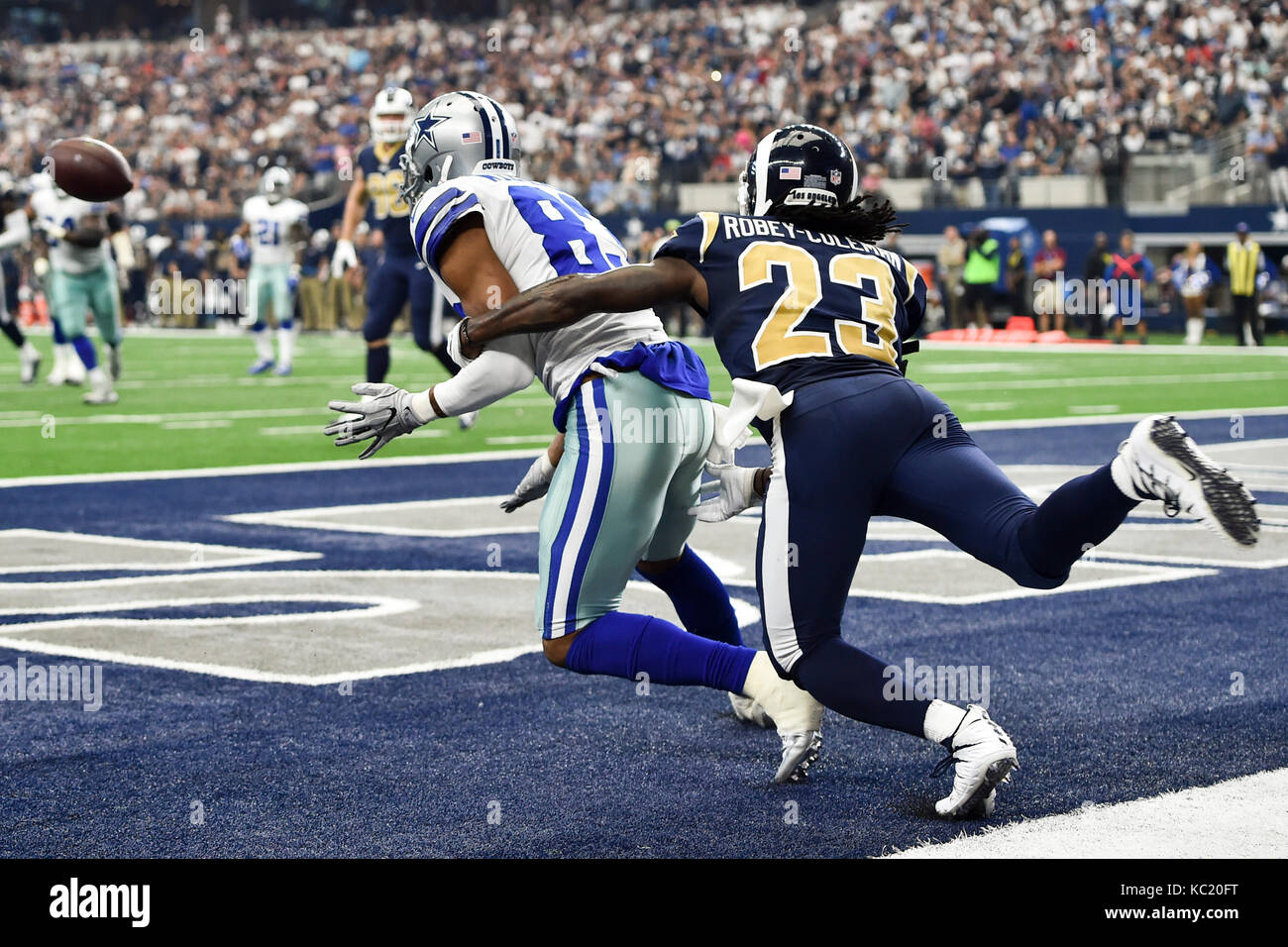 Arlington, Texas, USA. 1st Oct, 2017. Los Angeles Rams cornerback Nickell Robey-Coleman (23) breaks up a pass ended for Dallas Cowboys wide receiver Terrance Williams (83) in the second half of the NFL football game between the Los Angeles Rams and the Dallas Cowboys at AT&T Stadium in Arlington, Texas. The Los Angeles Rams defeated theDallas Cowboys 35-30. Shane Roper/CSM/Alamy Live News Stock Photo