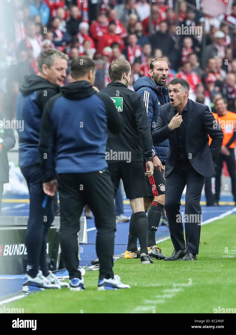 Bayern Munich's Willy Sagnol (R) and 1860 Munich's Lars Bender (L) shown in  action during the soccer friendly FC Bayern Munich vs TSV 1860 Munich at  Allianz-Arena in Munich, Germany, 26 January