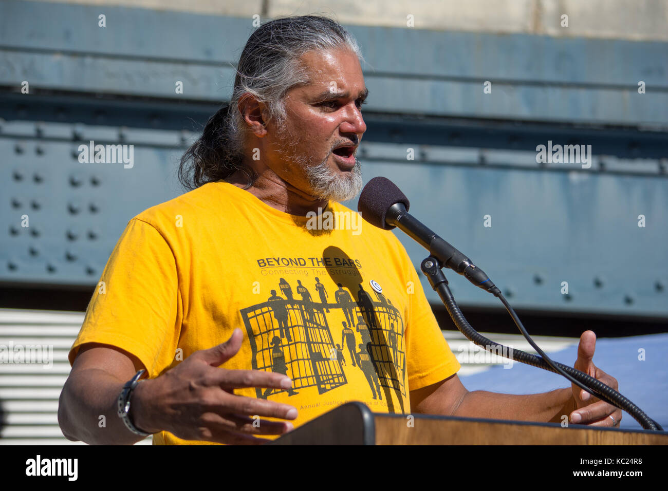 New York, USA. 01st Oct, 2017. Ravi Ragbir, Executive Director, New Sactuary Coalition, supporting immigrant rights. Social justice activists rallied and marched for racial justice from Brooklyn across the Brooklyn Bridge to Manhattan. Credit: M. Stan Reaves/Alamy Live News Stock Photo