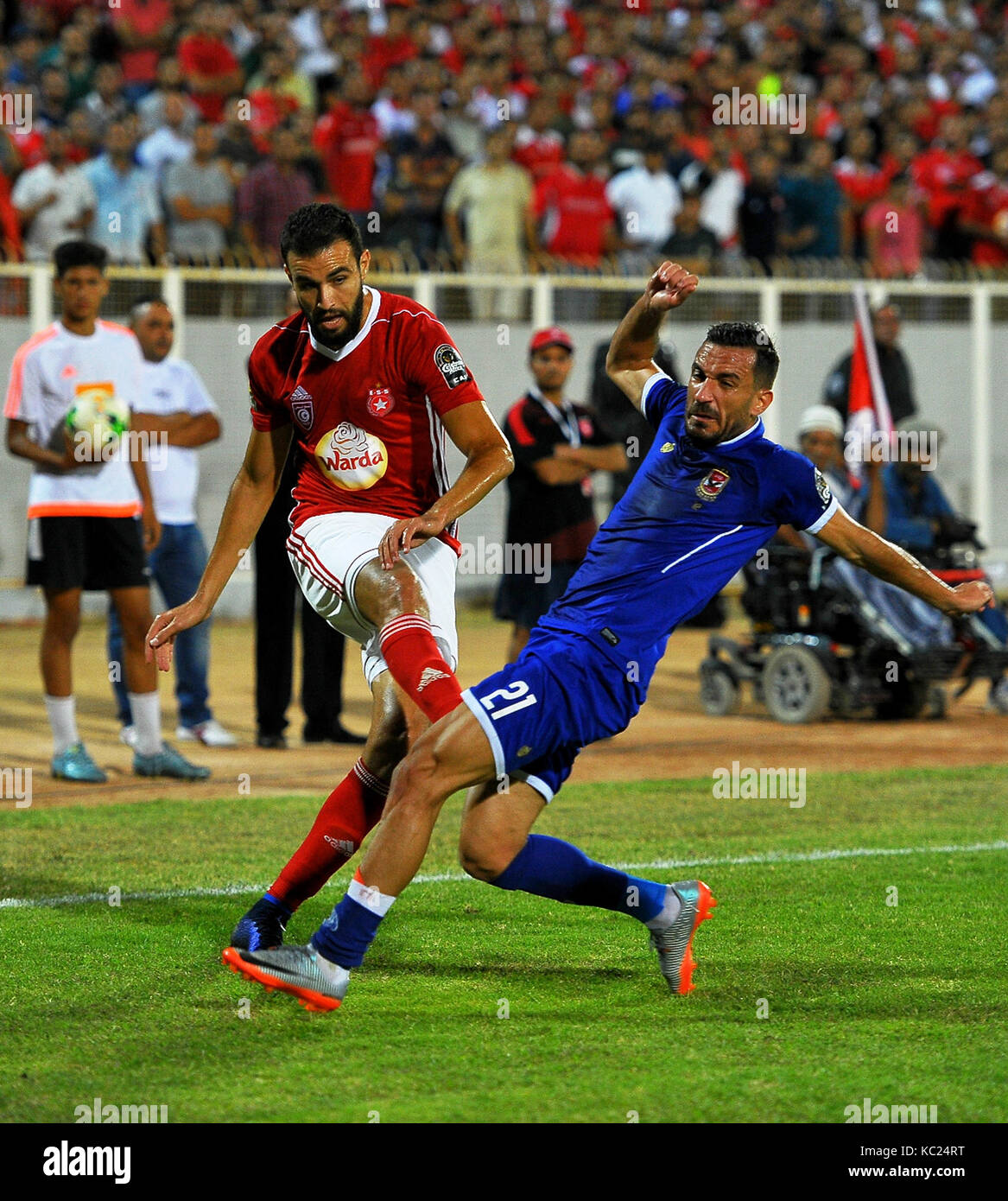 Sousse. 1st Oct, 2017. Ali Maaloul (R) of Egypt's Al Ahly vies with a player of Tunisian Etoile sportive du Sahel during CAF Champions League semifinal first leg match at the Olympic Stadium in Sousse, Tunisia on Oct.1, 2017. Etoile sportive du Sahel won 2-1. Credit: Adele Ezzine/Xinhua/Alamy Live News Stock Photo