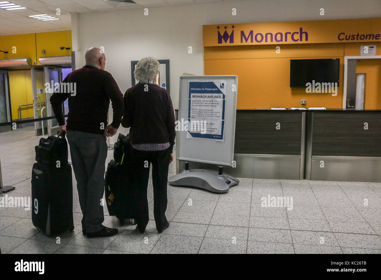 London, UK. 2nd Oct, 2017. Gatwick Airport: Monarch airline service desk at Gatwick Airport. Monarch Airlines which was founded in 1967 has ceased trading and entered into administration due to loss in revenue which is blamed on Terror attacks in Tunisia and Egypt and its 300,000 future bookings for flights and holidays have been cancelled . The British Government has asked the Civil Aviation Authority (CAA) to coordinate flights back to Britain for all Monarch customers currently stranded overseas and customers will not bear extra costs on new flights Credit: amer ghazzal/Alamy Live News Stock Photo