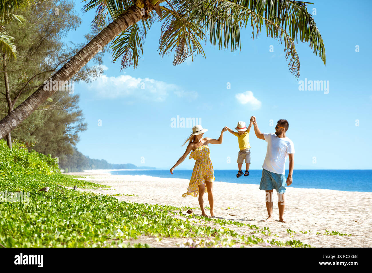 Happy family walking beach tourism Stock Photo