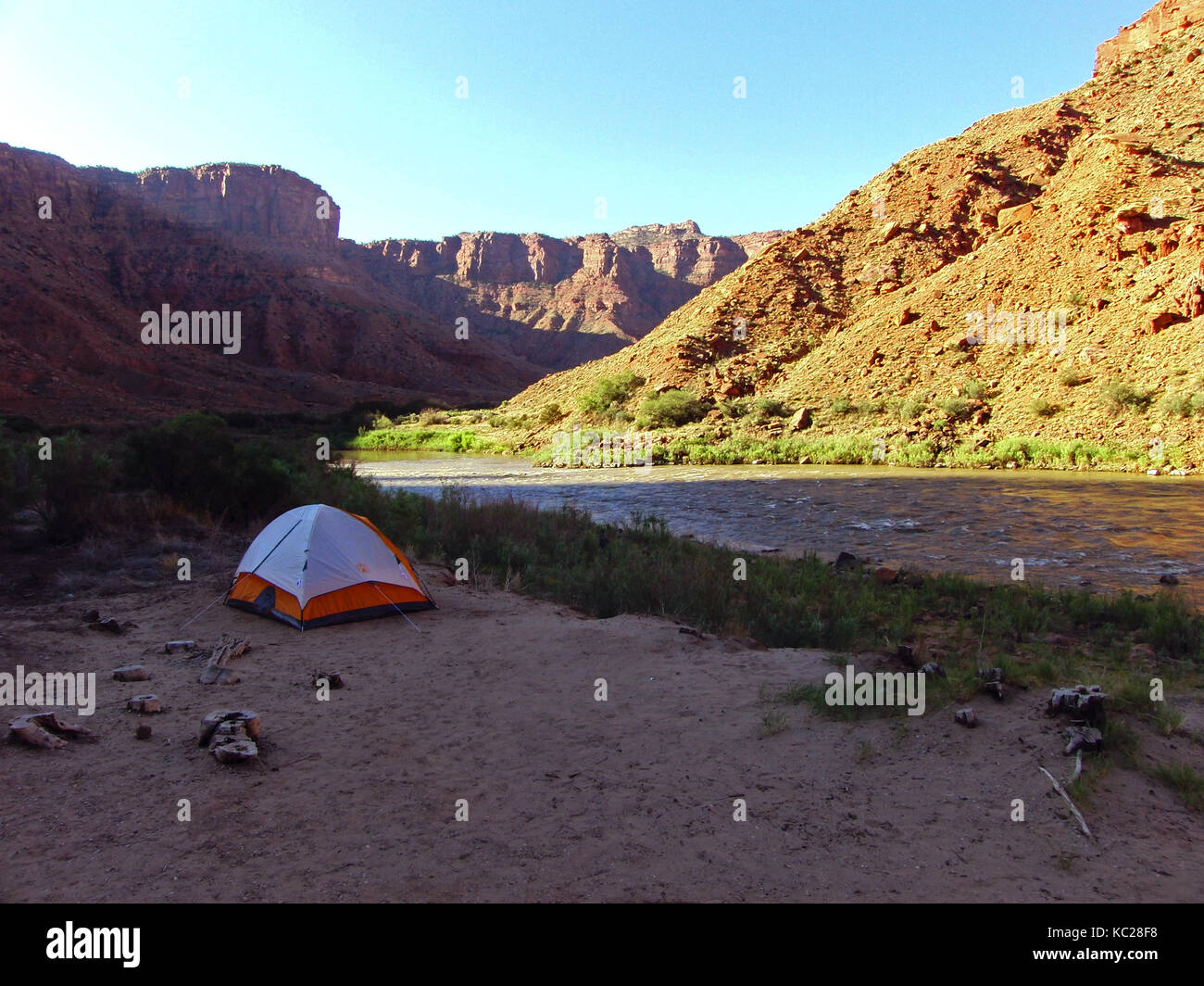 Camping tent on the Colorado river bank in the Grand Canyon. Morning
