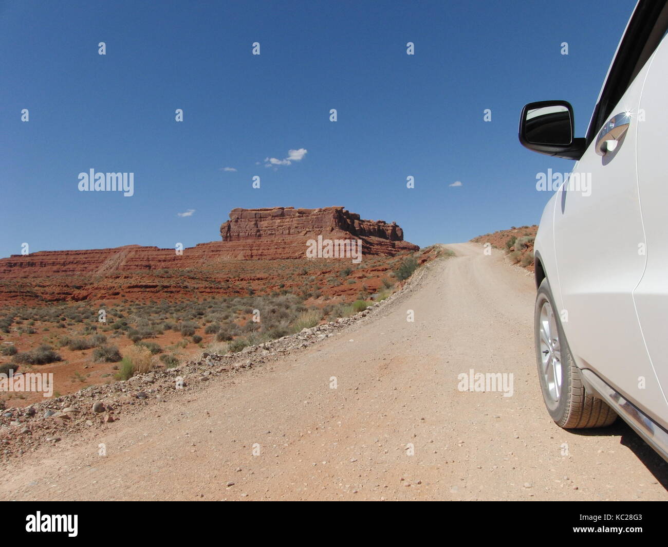 The car in the desert. Concept of an adventure. At the beginning of an obscurity Stock Photo