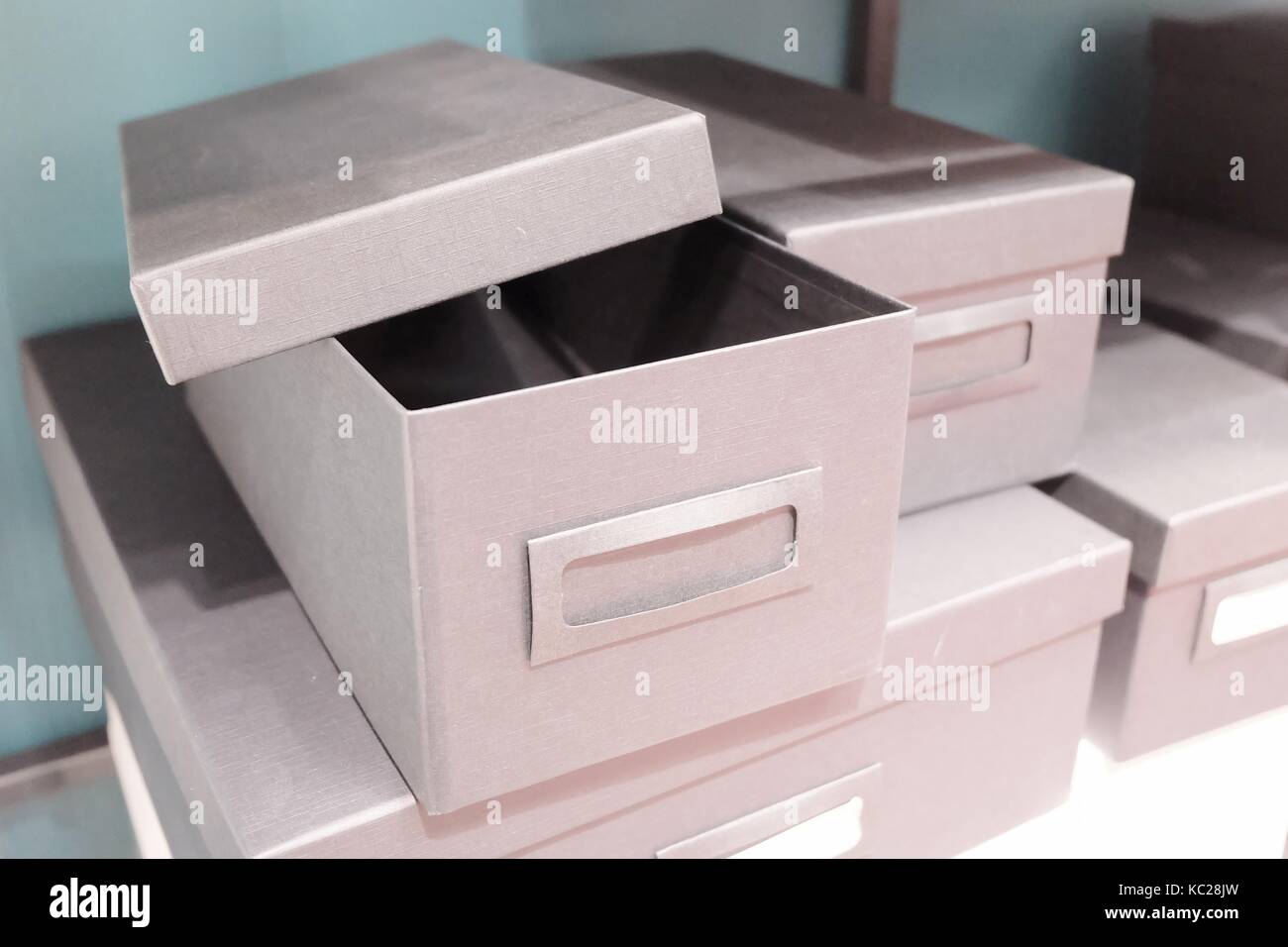 Stack of Empty Office Storage Boxes or Archive Boxes Used for Storing