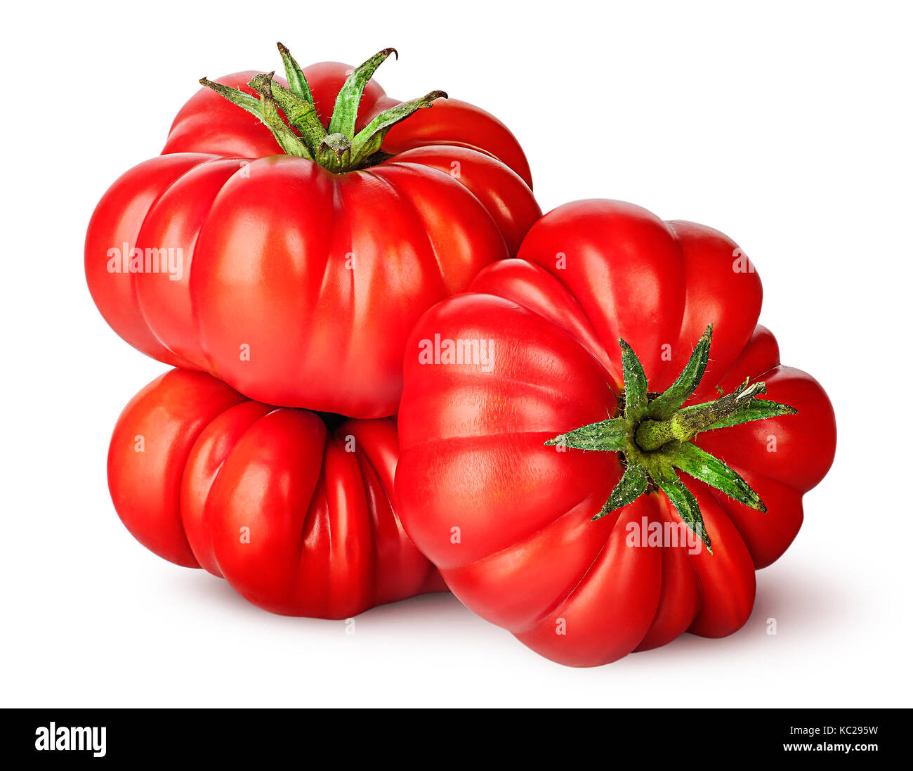 Three tomatoes next to each other Stock Photo