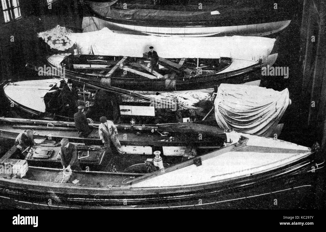 1932  - RNLI (Royal National Lifeboat Institution) lifeboats being repaired at Poplar docks, east London. Stock Photo