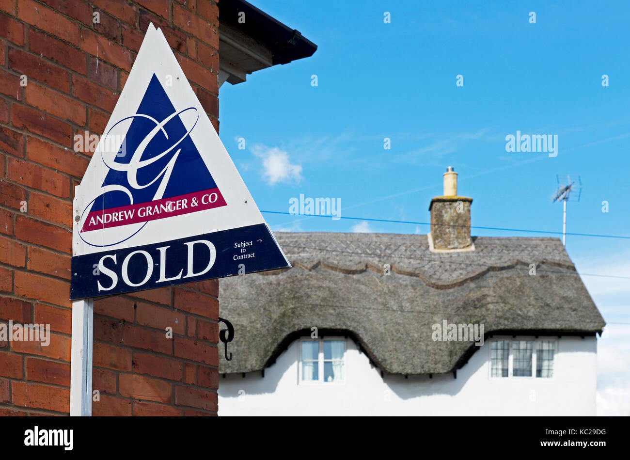 Sold sign on house, England UK Stock Photo - Alamy