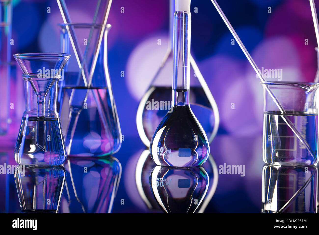 Laboratory concept. Beakers and testtubes. Coloful bokeh background