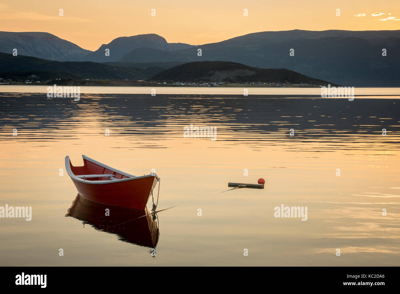 Classic Row Boat at anchor on Bonne Bay, Gros Morne National Park Stock