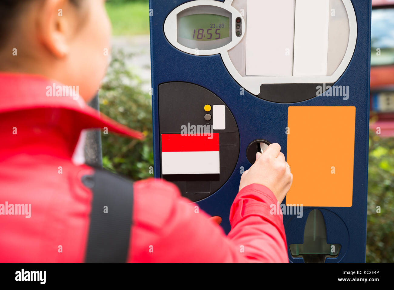 Young Beautiful Woman Inserting Coin In Parking Meter Stock Photo Alamy