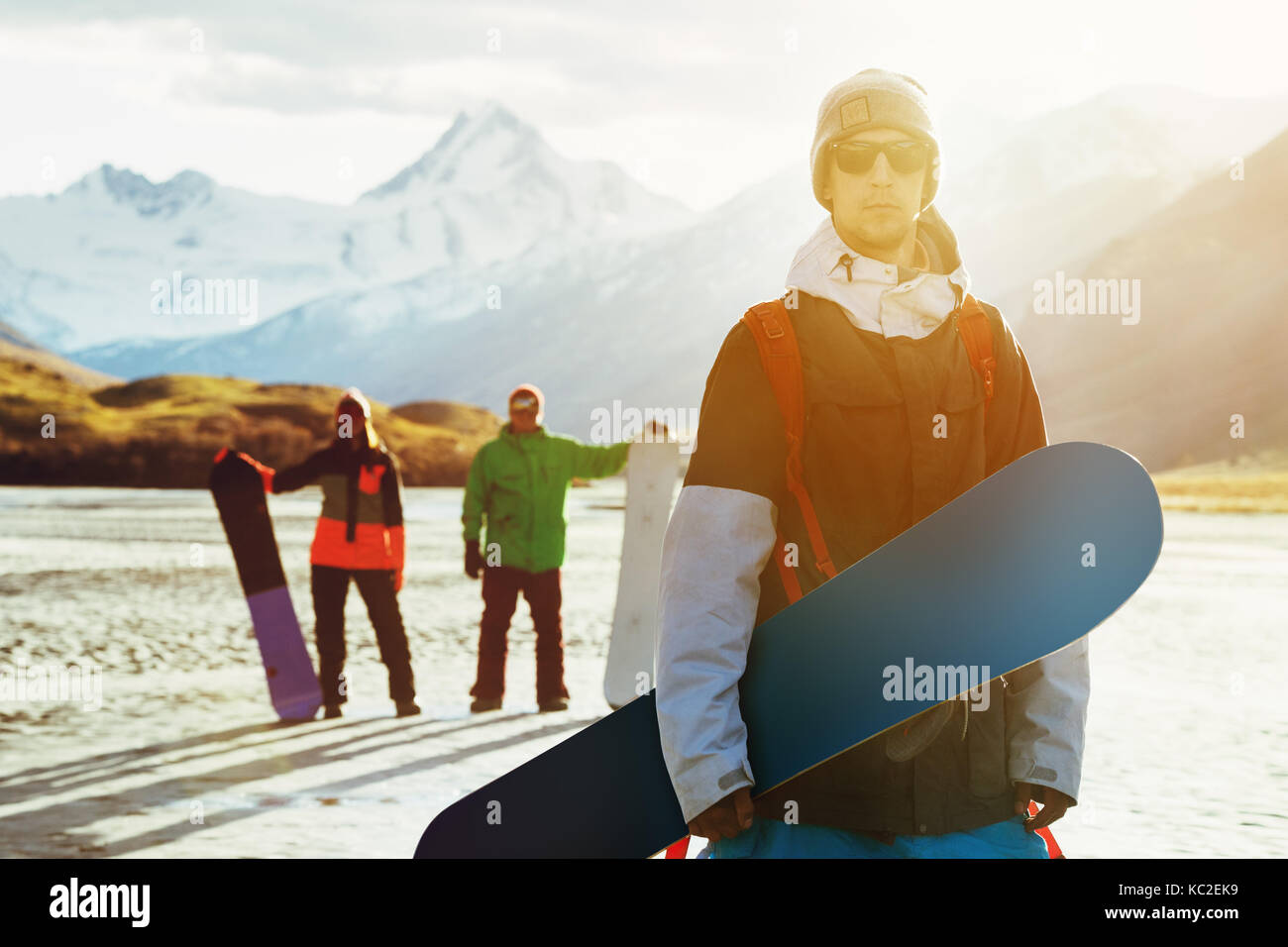 Snowboarder friends snowboarding ski concept Stock Photo