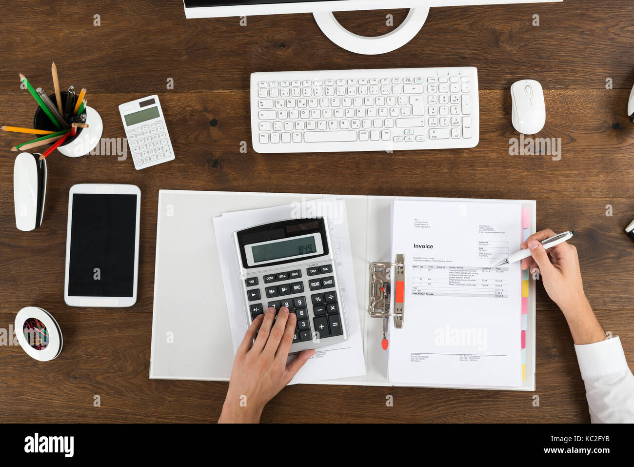 Calculating invoice hi-res stock photography and images - Alamy