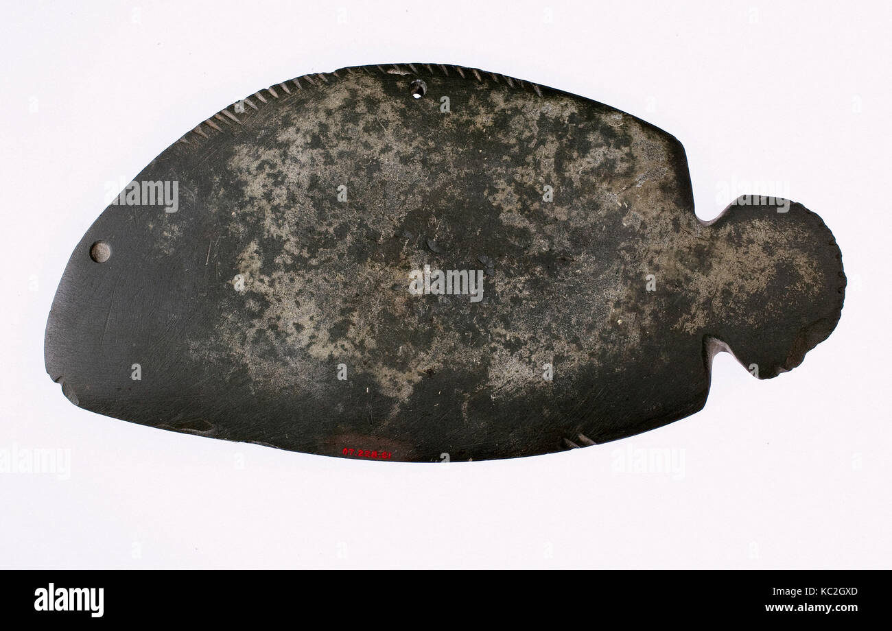 Palette shaped like a fish, Predynastic, Naqada II, ca. 3650–3300 B.C., From Egypt, Greywacke, L: 18.2 x W: 9.1 x Th. 0.6 cm (7 Stock Photo