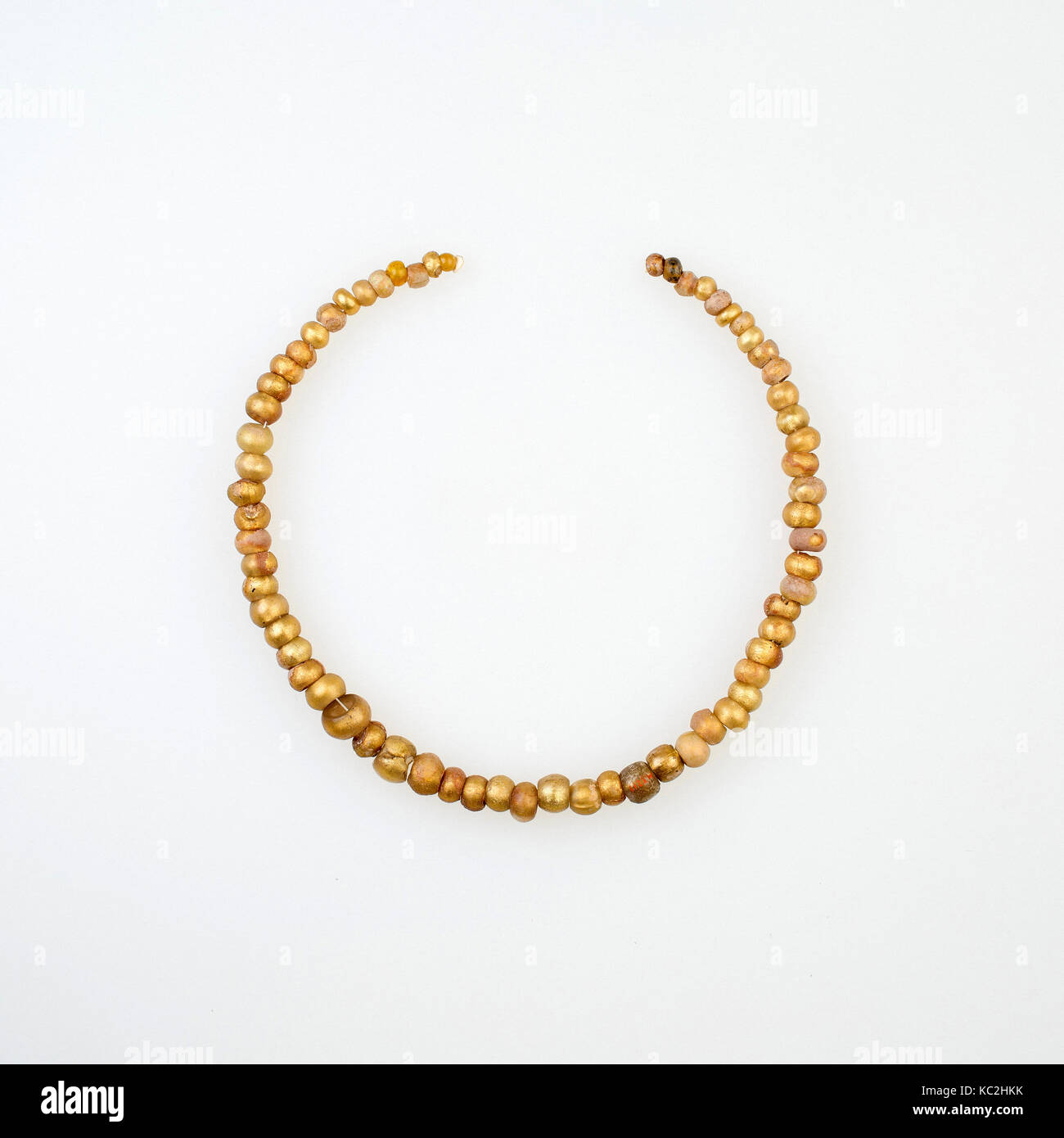 String of 65 Beads, Ptolemaic Period–Roman Period, 2nd century BC–2nd century AD, From Egypt, glass, gold foil, L. 33 cm (13 in Stock Photo