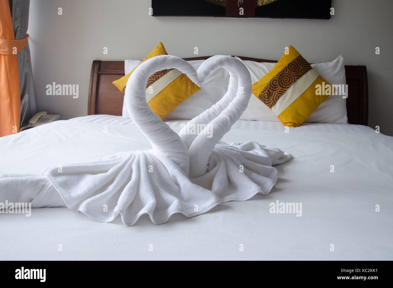 Interior bedroom Swan towel on the bed. The hotel rooms are romantic