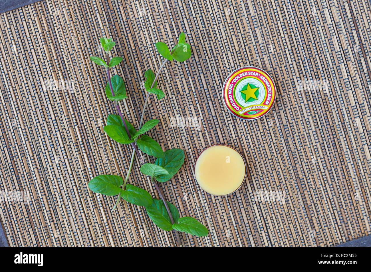 Vietnamese traditional golden star balm 'Cao Sao Vang' Stock Photo