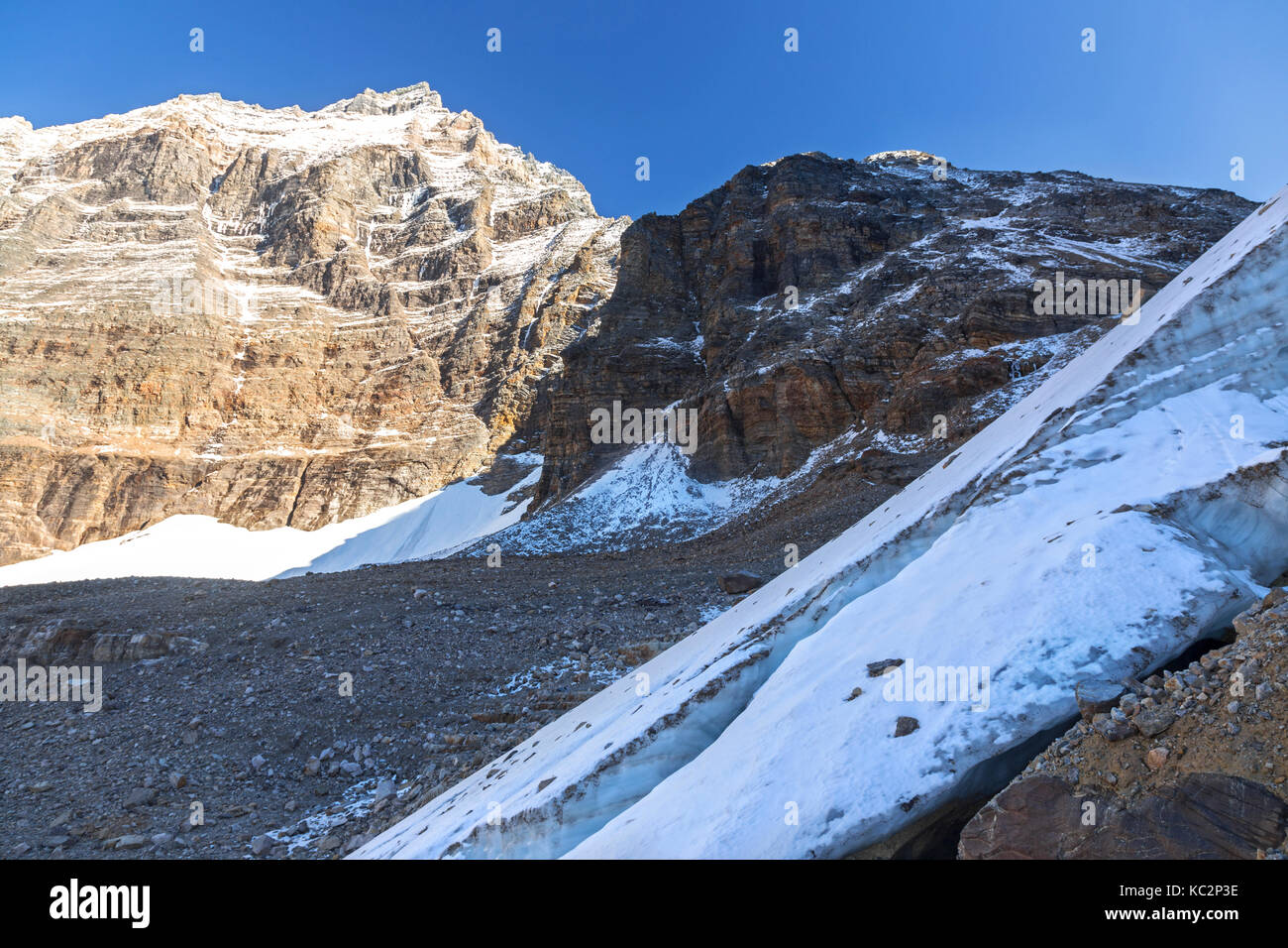 Melting Opabin Glacier Ice Snout Snowy Hungabee Mountain Peak Landscape. Yoho National Park Hiking Canadian Rockies British Columbia Canada Stock Photo