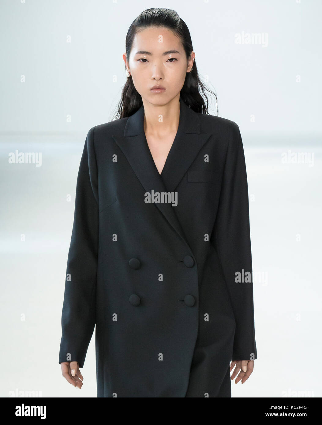NEW YORK, NY - September 10, 2017: Yun Gao walks the runway at the ...