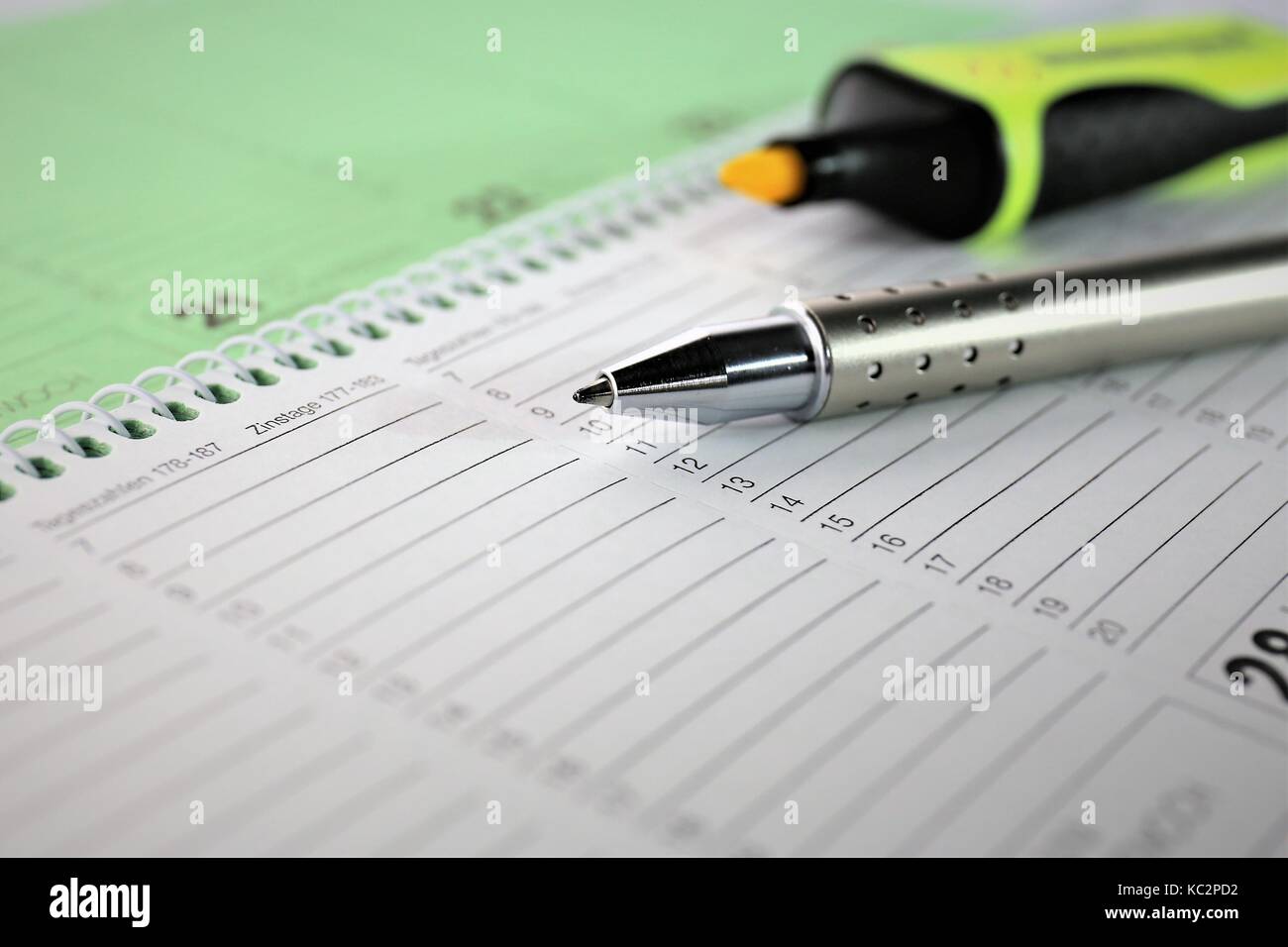 An Image of a calendar and a pen business Stock Photo Alamy