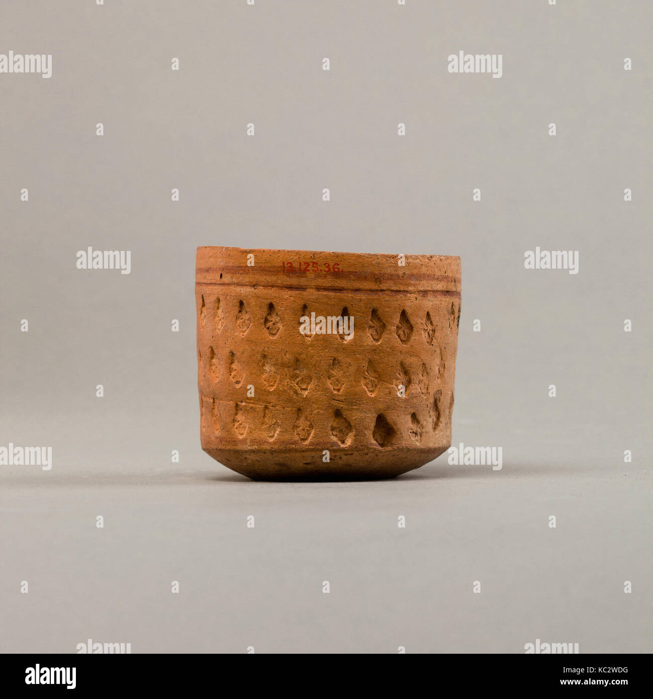 Cup with three rows of impressed decoration, 1st3rd century Stock