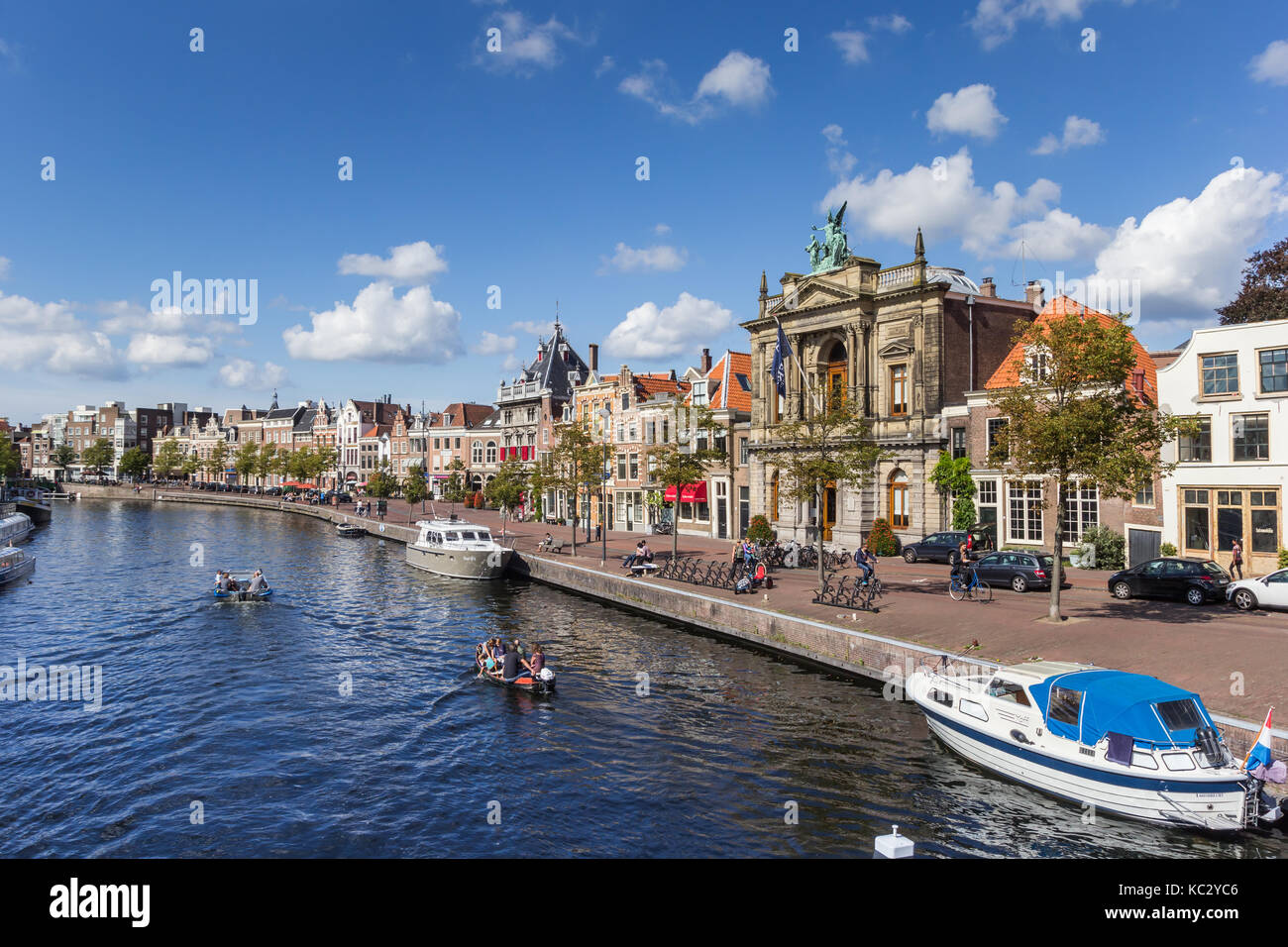 Canal with boats and old houses at the Spaarne in Haarlem, Netherlands Stock Photo